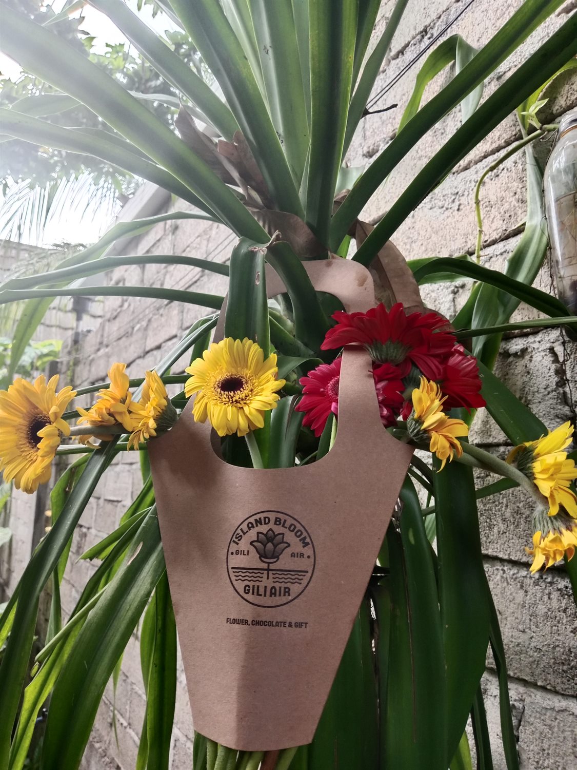 Bright bouquet in kraft paper