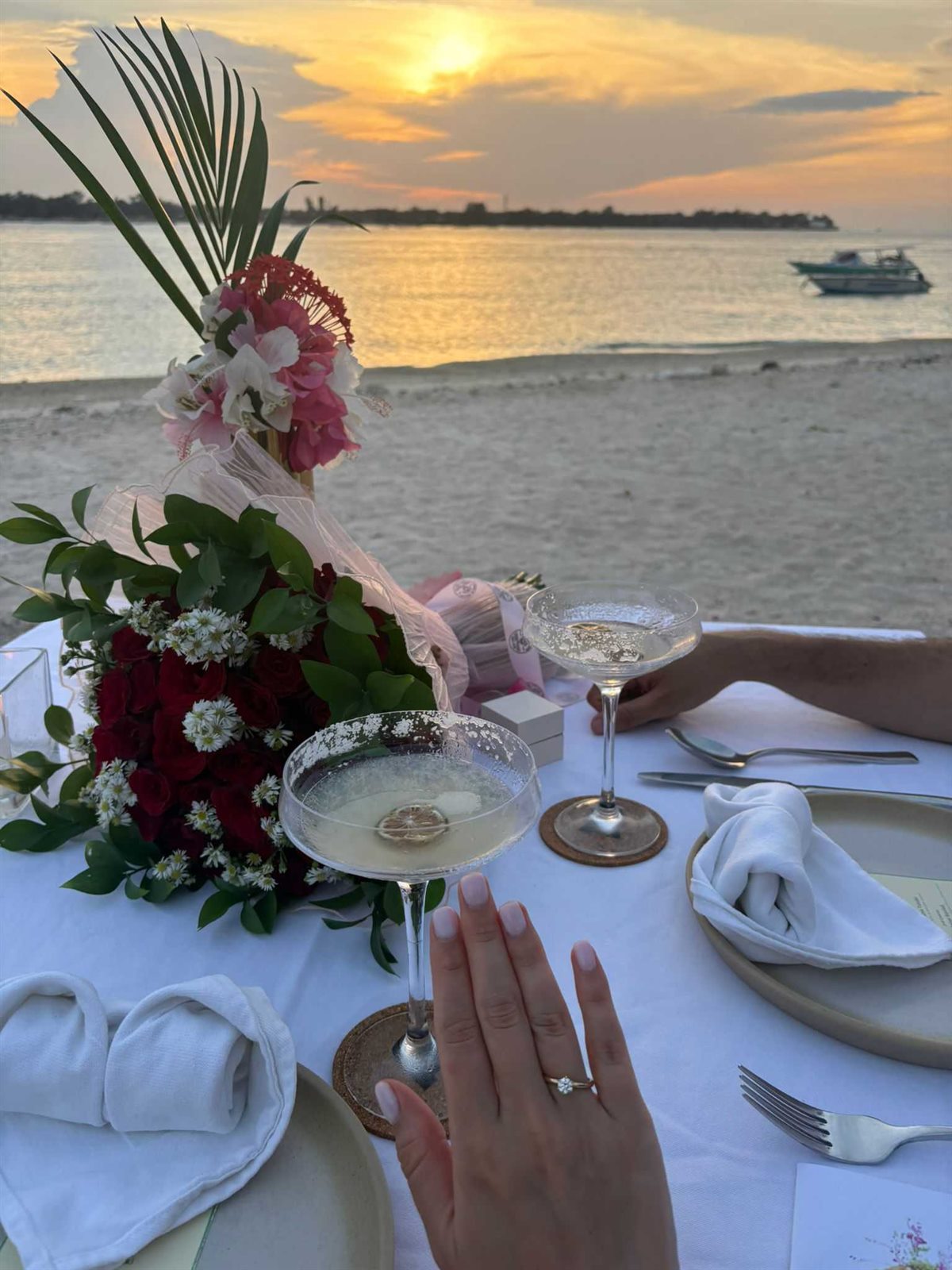 Floral arrangement on a beach dining table